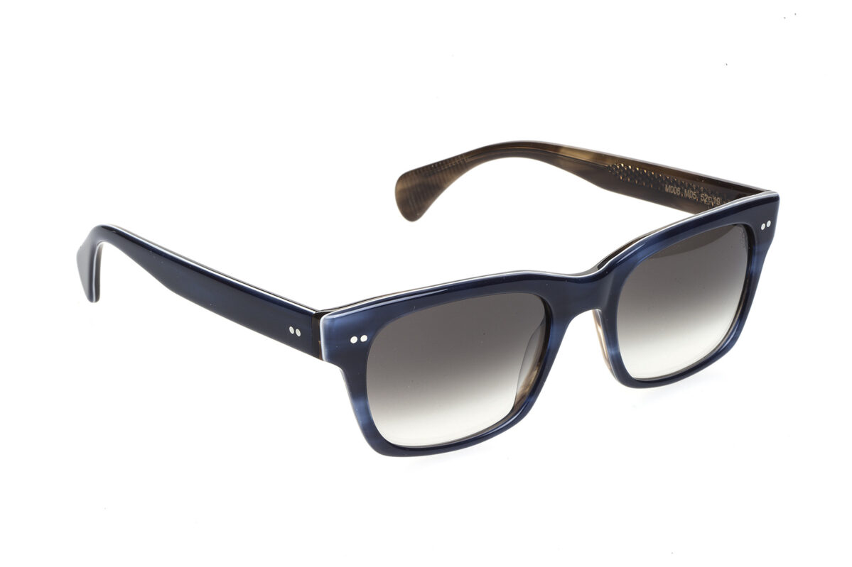 M006 di David Marc è un occhiale da sole dalla forma squadrata realizzata in acetato di alta qualità che offre una combinazione di robustezza e leggerezza