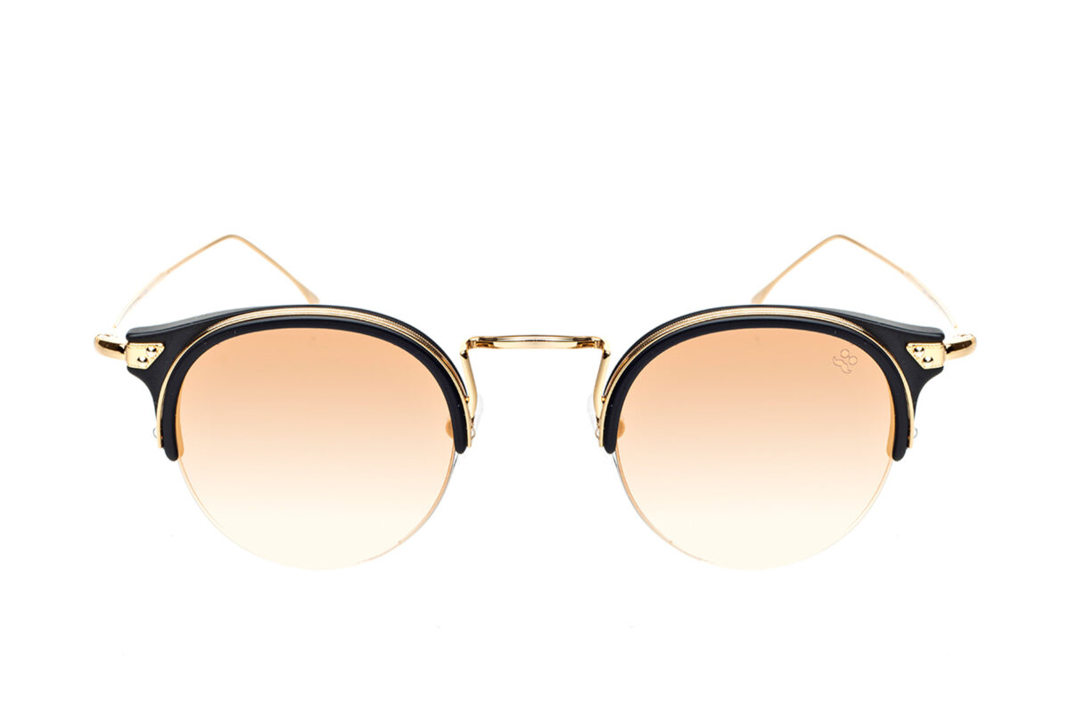 M015 di David Marc è un occhiale da sole con montatura tonda che incarna un'intramontabile eleganza, in acetato leggero e robusto per un comfort duraturo